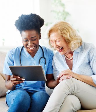 Home Health Nurse with Woman Men shaking hands at store